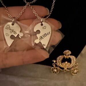 Mother and Daughter Silver Necklaces and Gold Carriage Pin